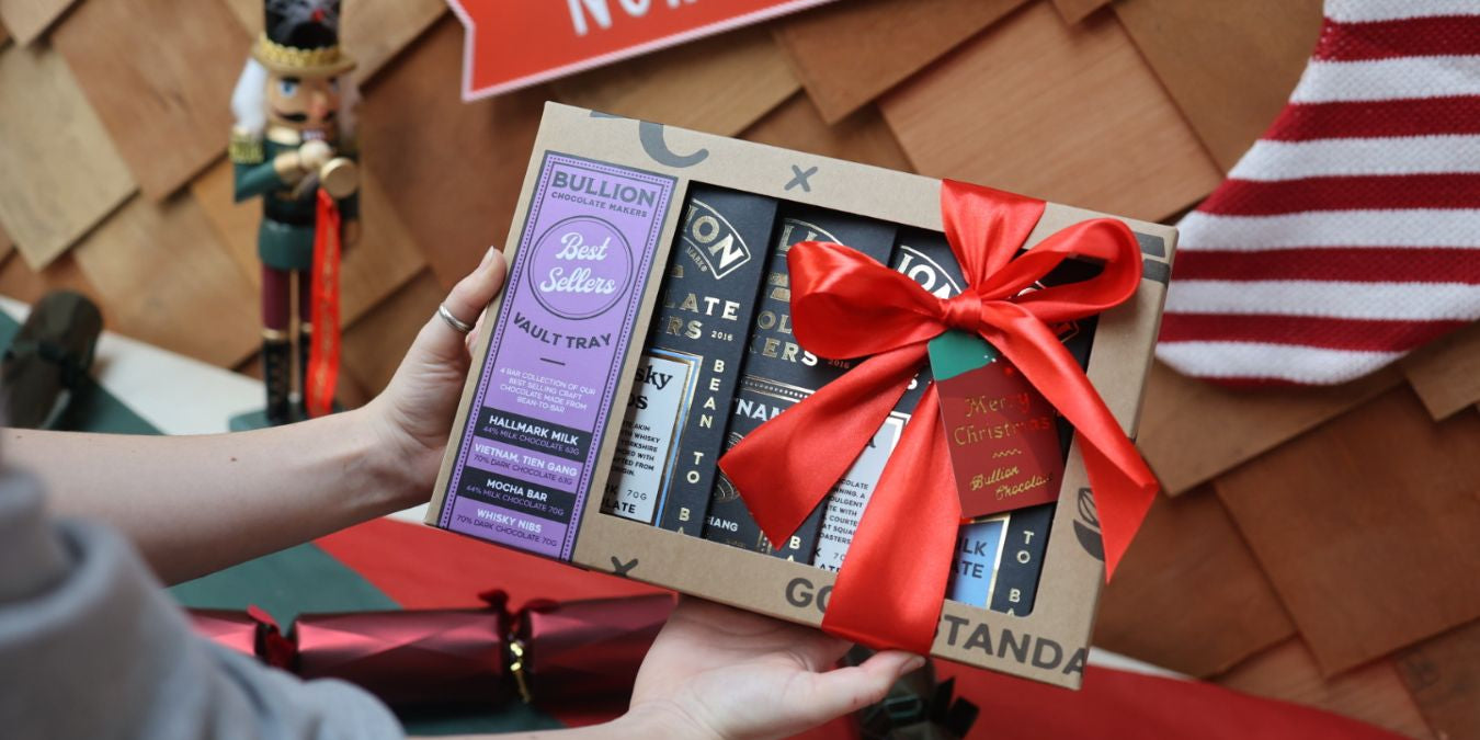 Bullion milk chocolate bar gift box wrapped in festive ribbon with gift tag
