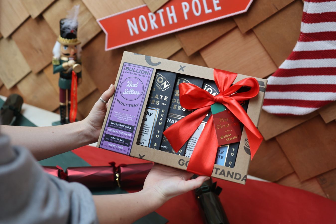 Bullion milk chocolate bar gift box wrapped in festive ribbon with gift tag